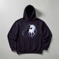 Hoodie with black cat and unicorn design surrounded by stars and mystical sparkles